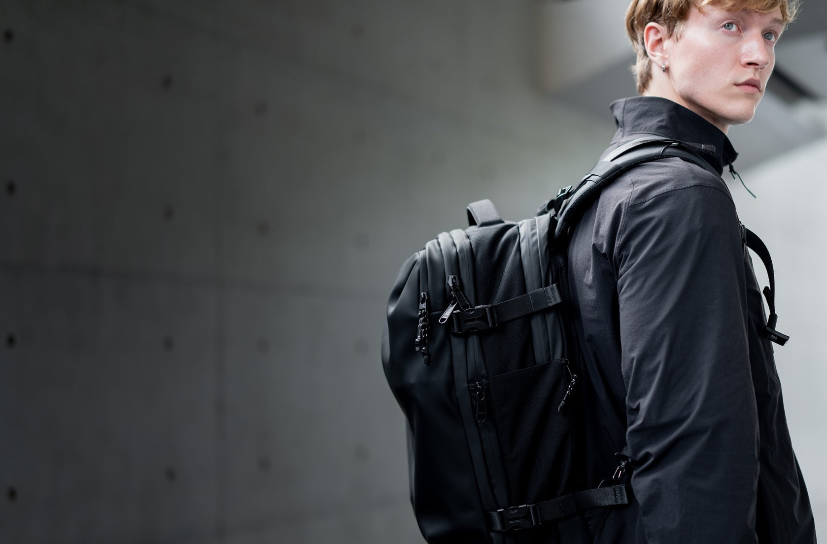 Black Voyage Vacuum Backpack Closeup Model - Mobile.jpg